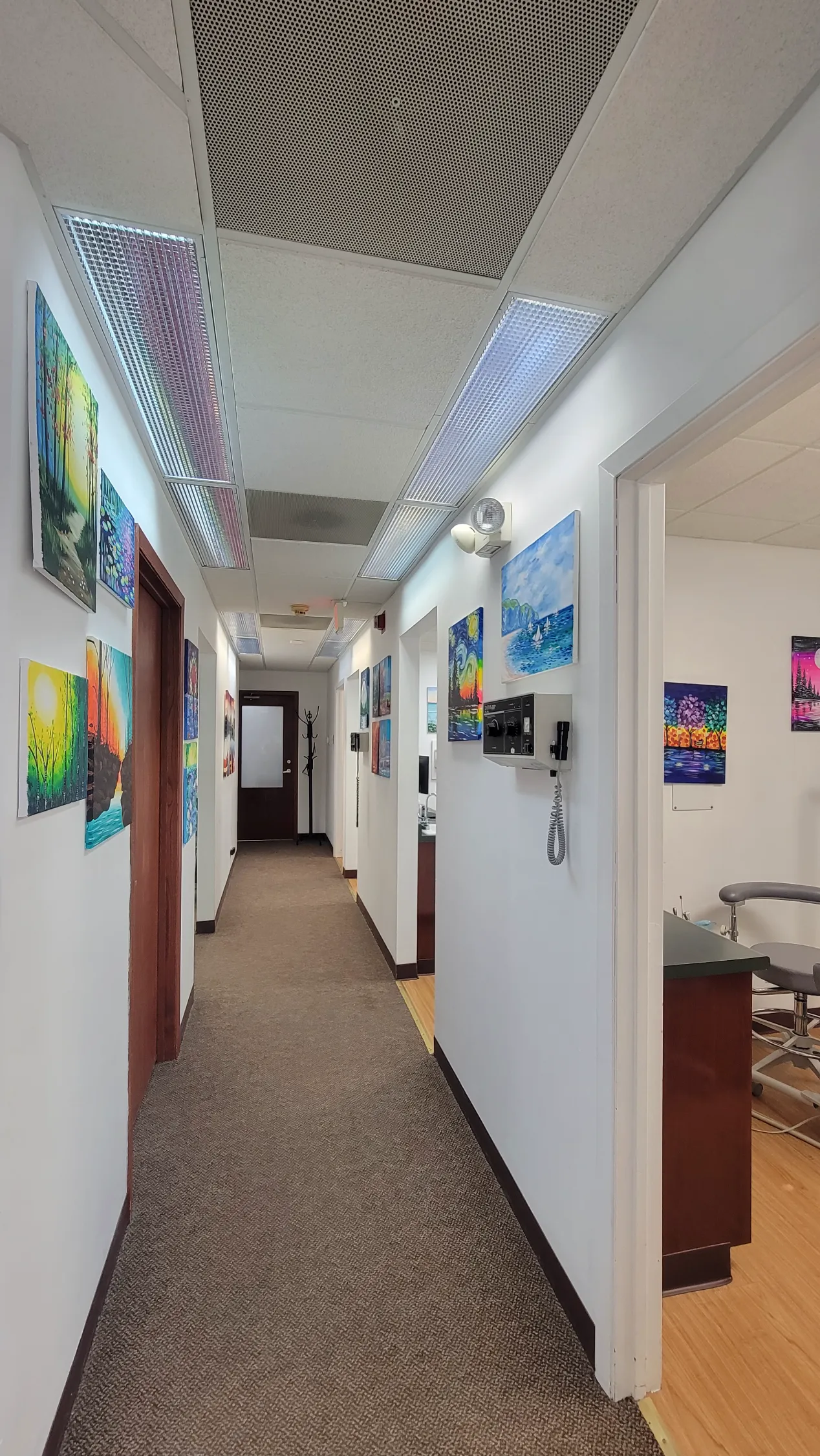 Art-lined hallway at Da Vinci Dental